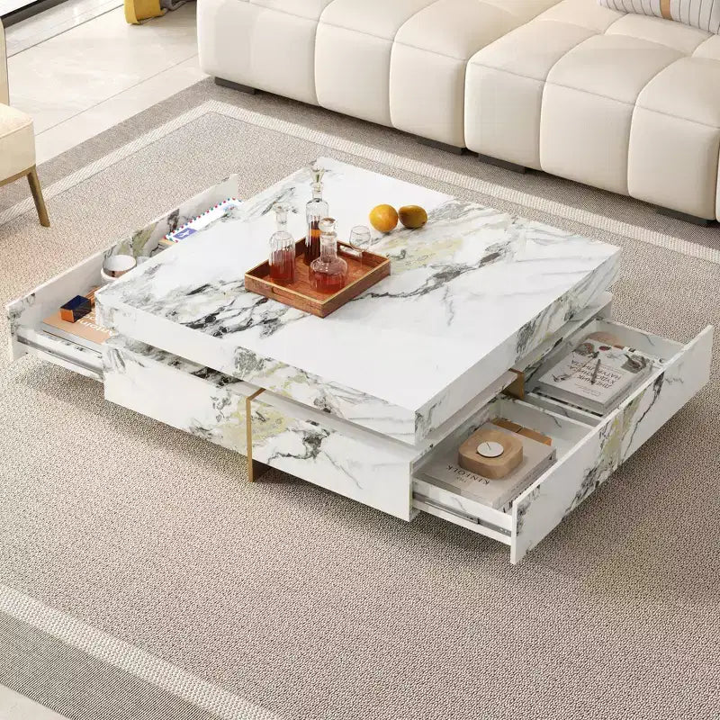 Table basse carrée blanche avec 4 tiroirs, plateau en faux marbre, piètement tréteau doré